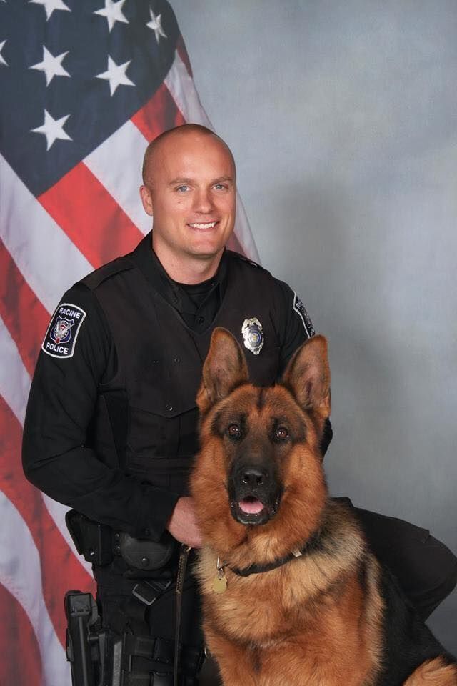 Officer Chad Melby with K-9 Dozer in 2015